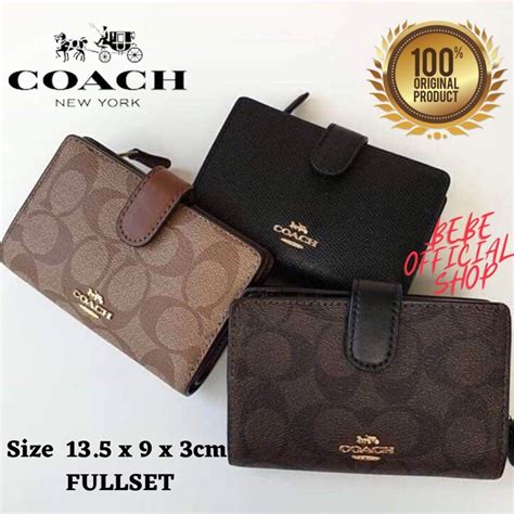 dompet coach wanita.